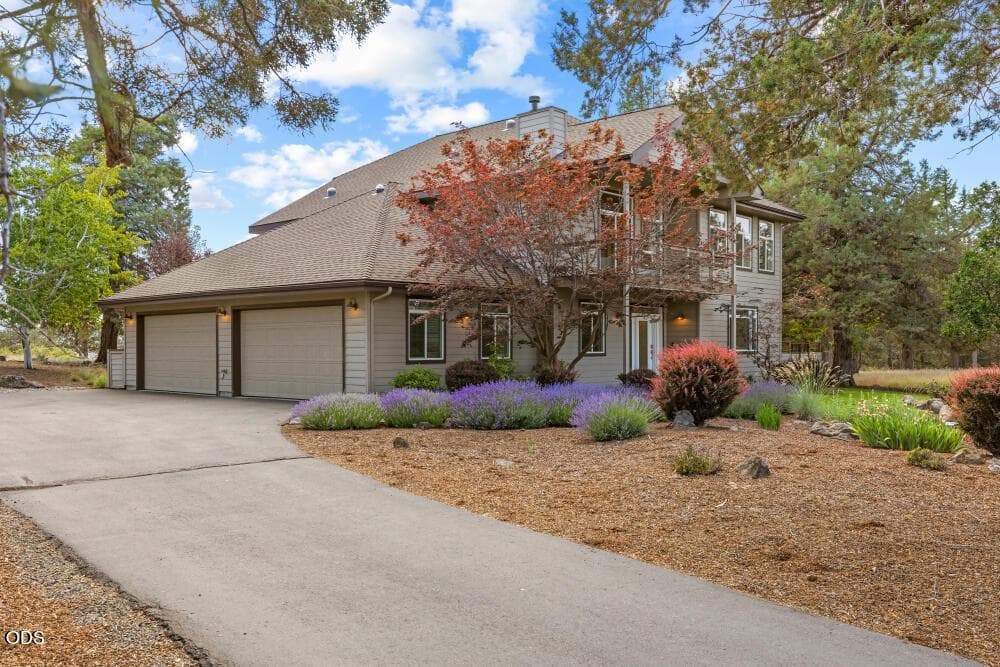 Paved drive to 4 car garage