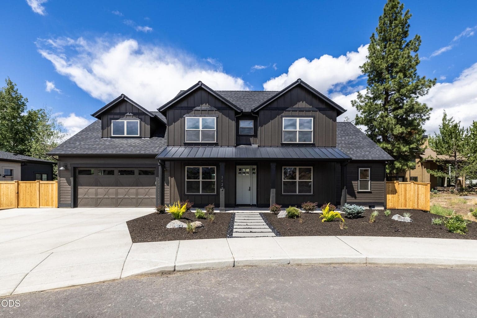 Shevlin West new construction with 3-car parking on driveway, large fenced yard