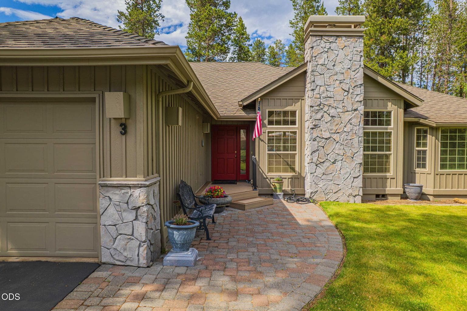 Timeless architectural design features natural stone accents