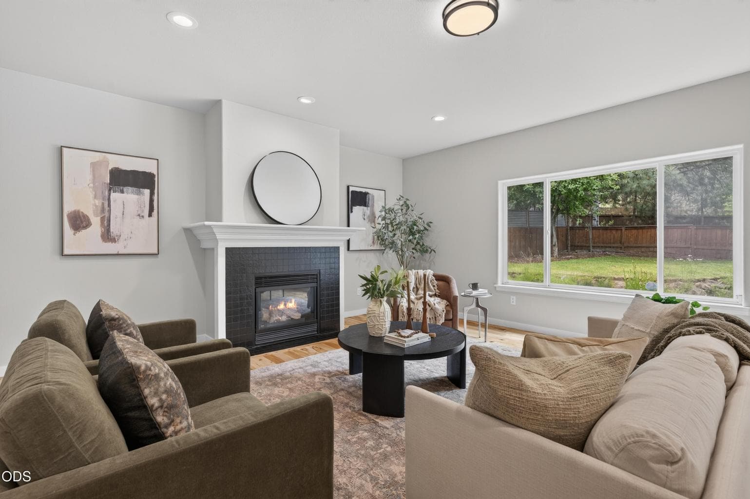 Great room and gas fireplace - view to backyard