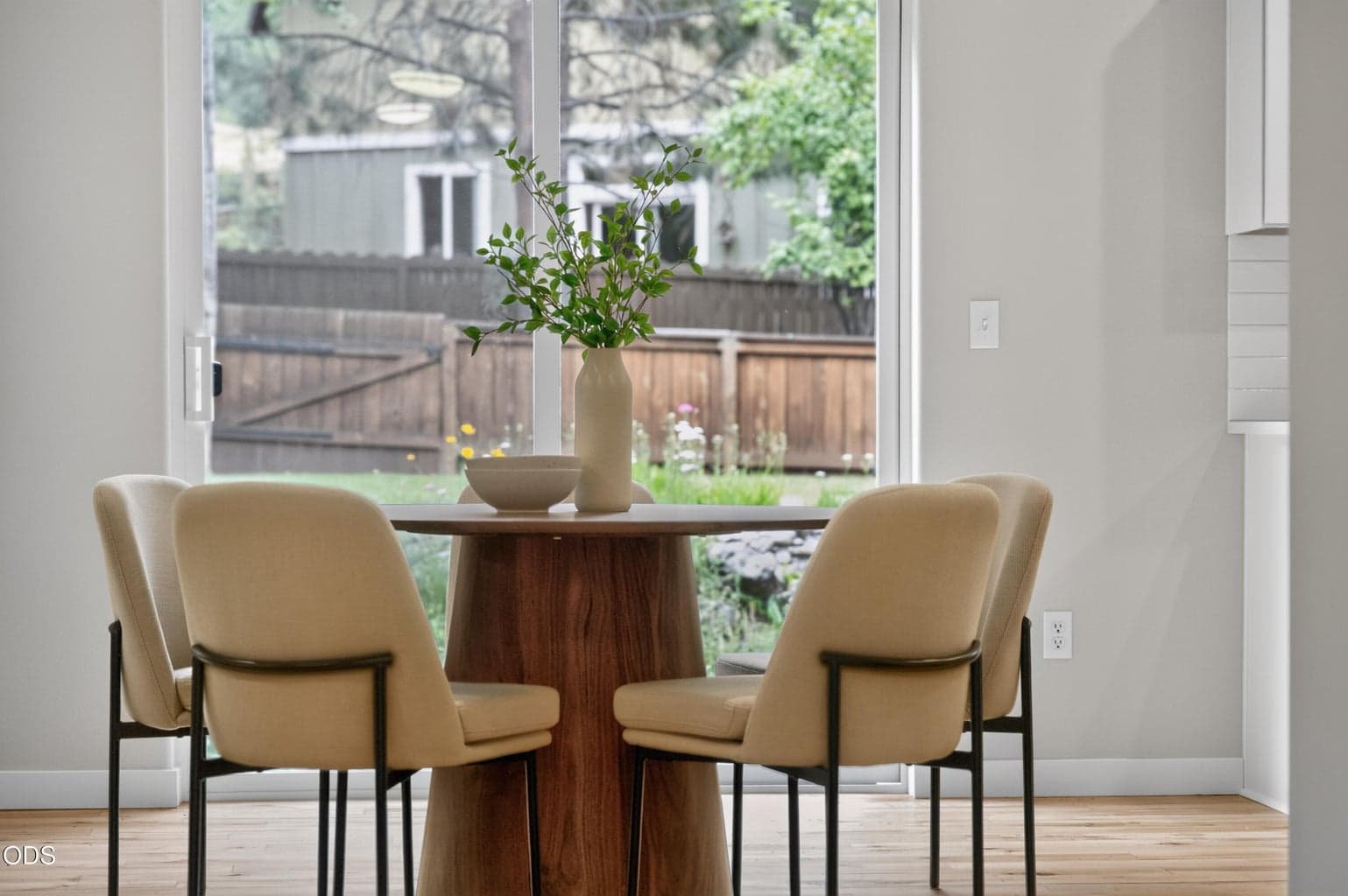 Dining area with slider to backyard