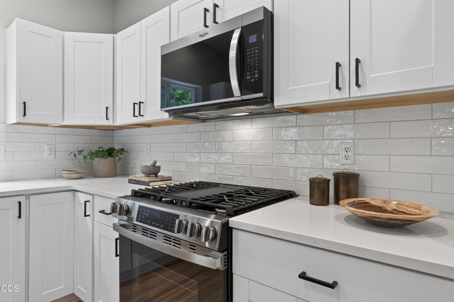 Kitchen with modern subway tile