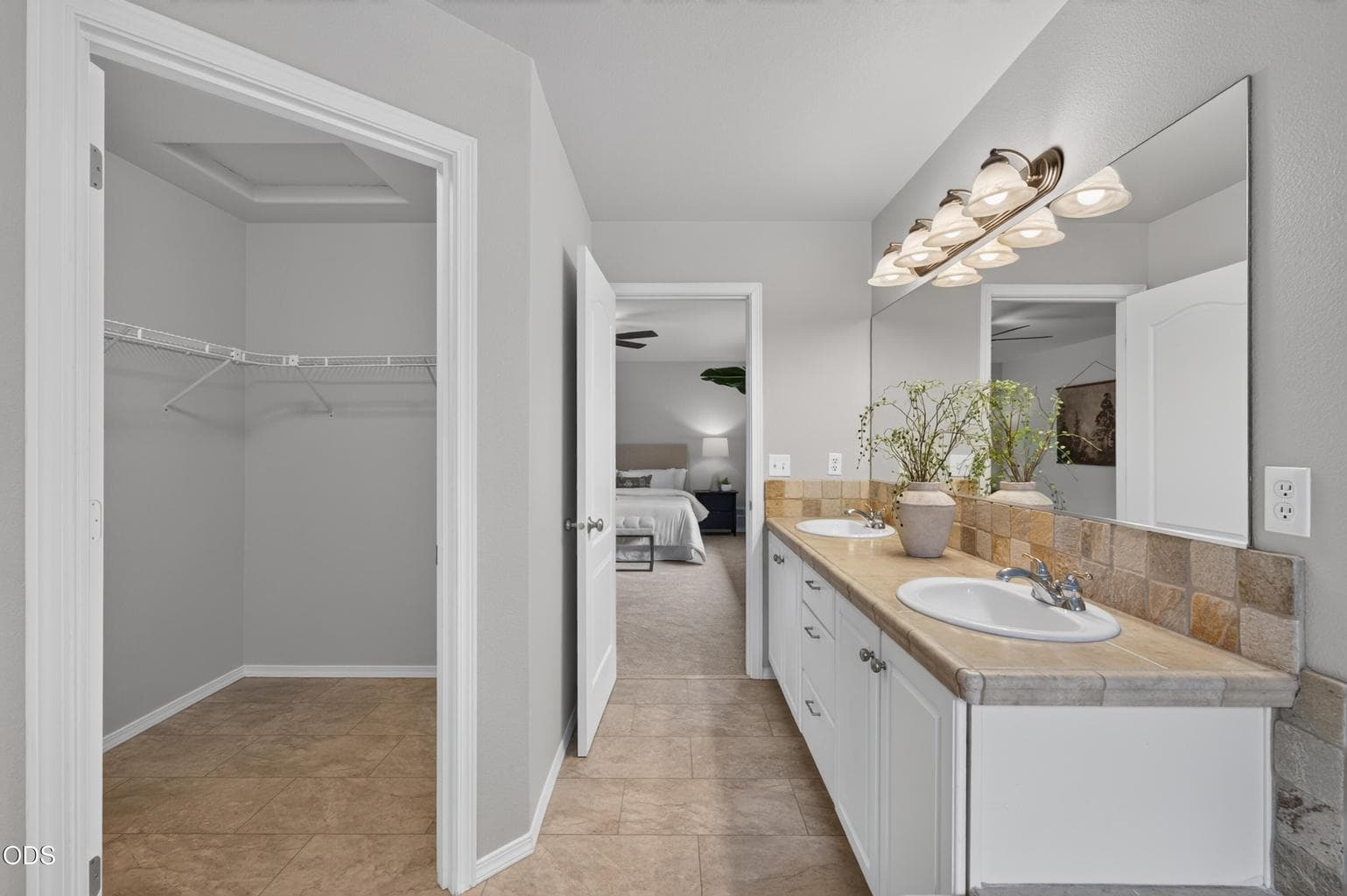 Primary ensuite bathroom vanity / closet