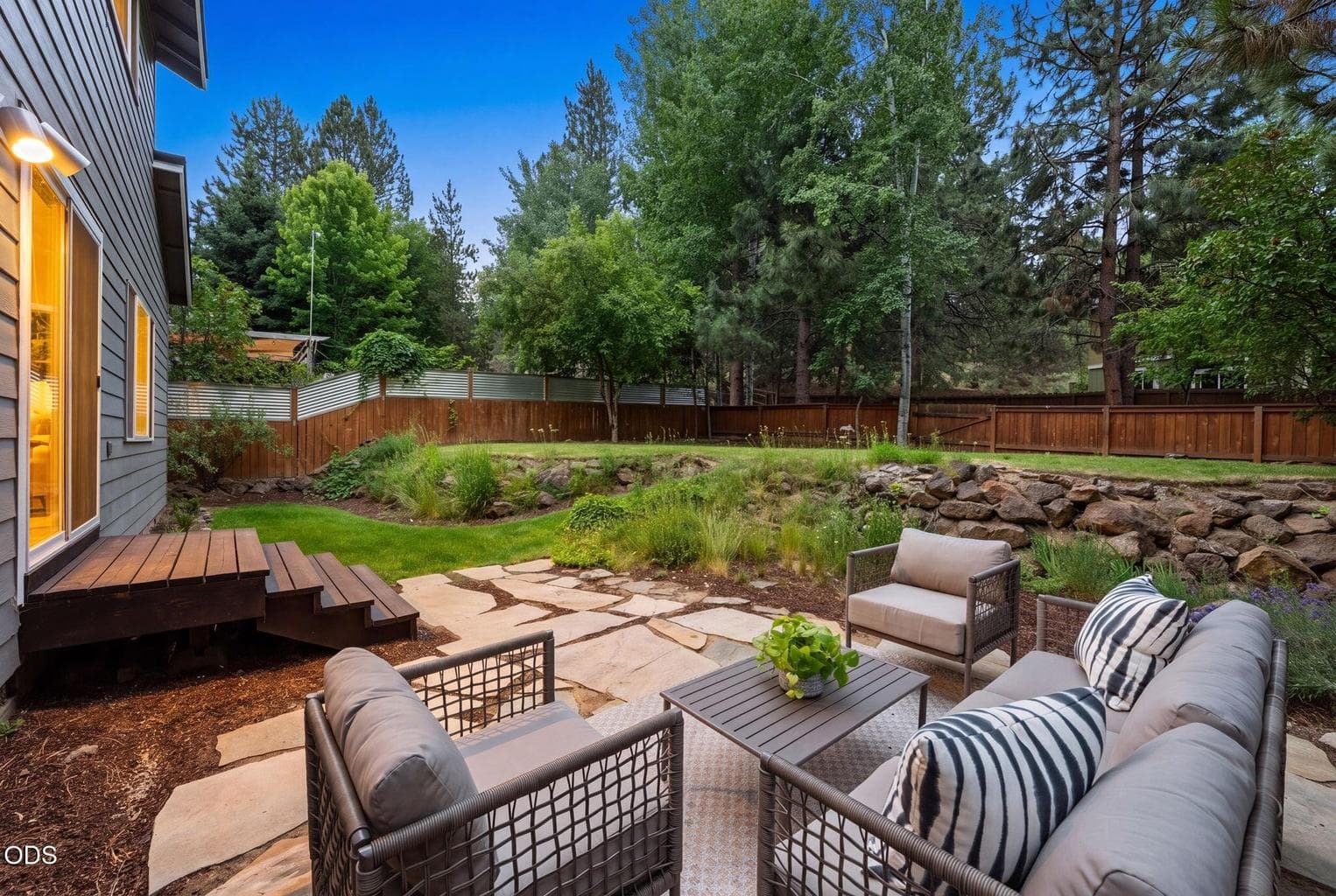 Flagstone patio / backyard at twilight