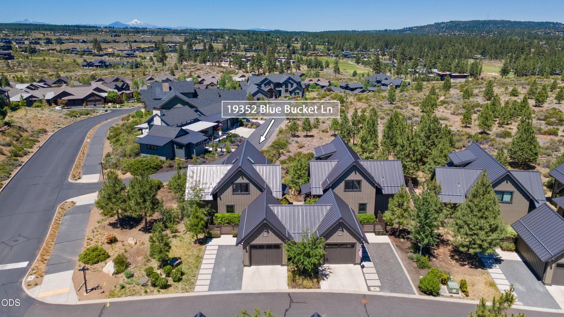 A corner lot and surrounding trees allow for additional privacy and natural beauty in this highly desirable Tetherow Cabin.