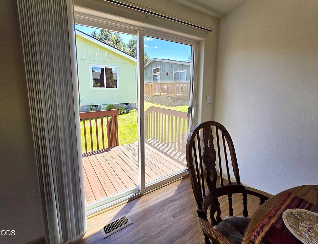 Sliding Glass Doors in dining area lead to back deck