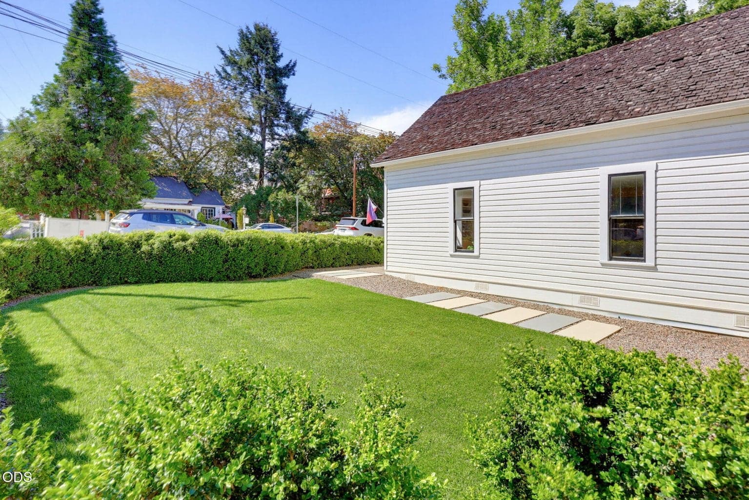 The property has a lovely side yard