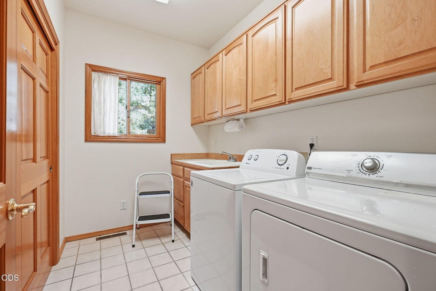 Laundry Room with Storage Cabinets
