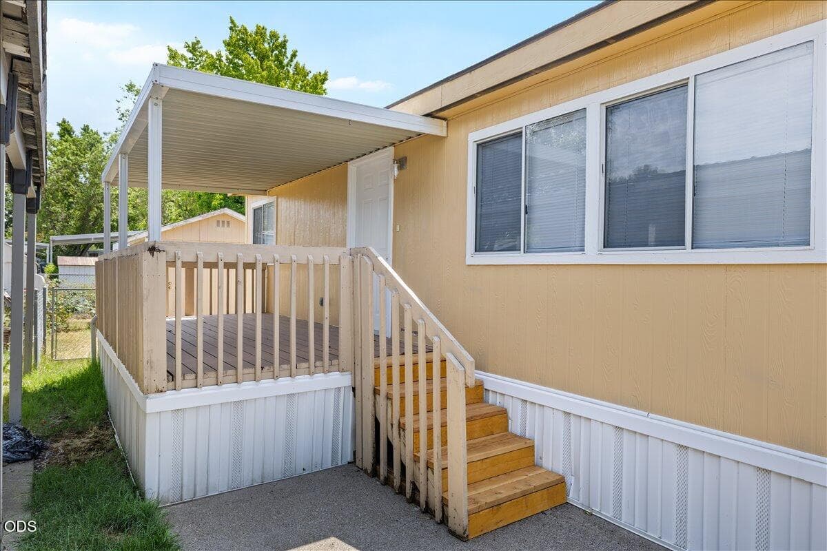 Front door with large covered deck