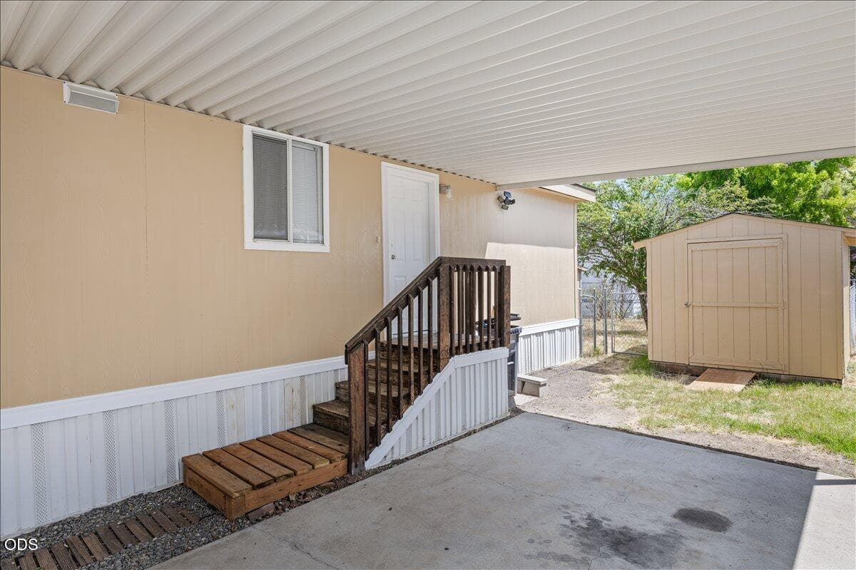 Side entrance through carport