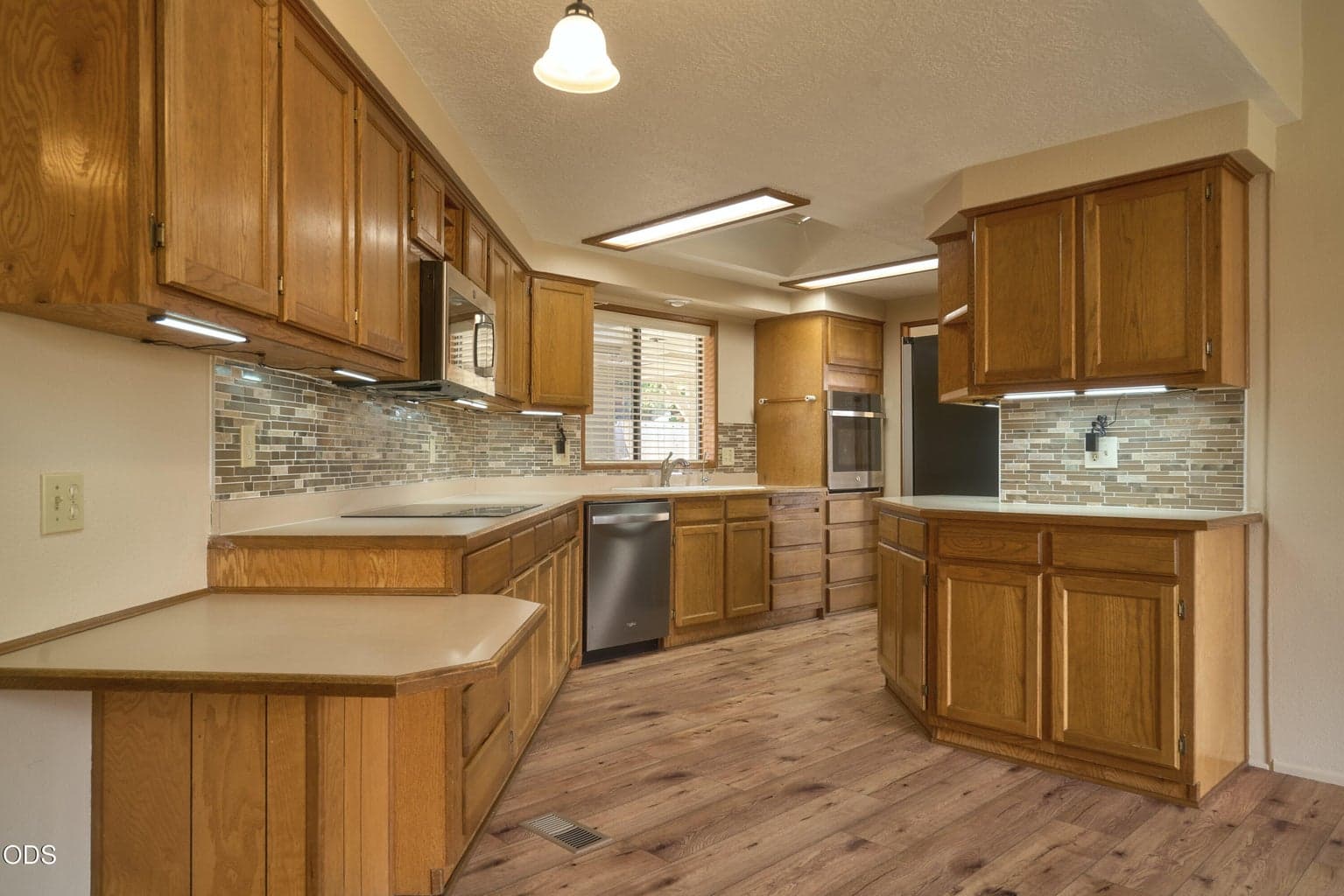Large Kitchen with lots of storage and counter top space.