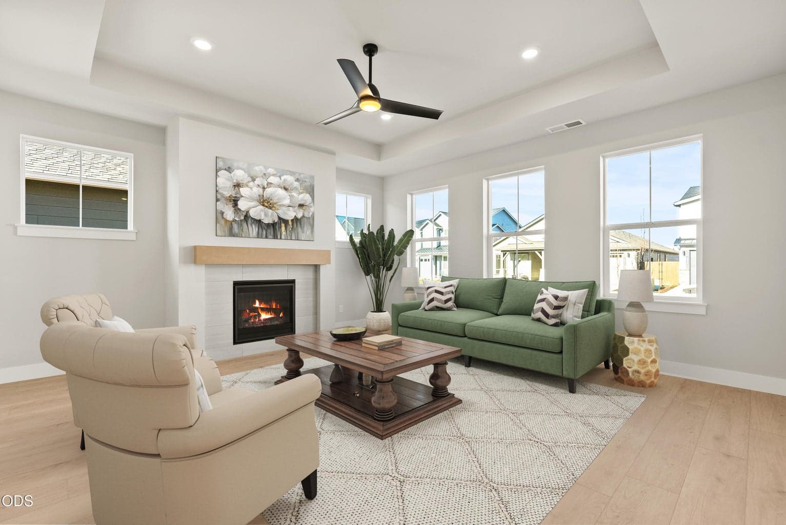 Greatroom with gas fireplace. Virtual staging. Finish selections vary.