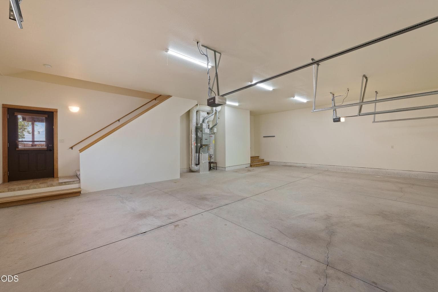 Stairway in garage to access bonus space