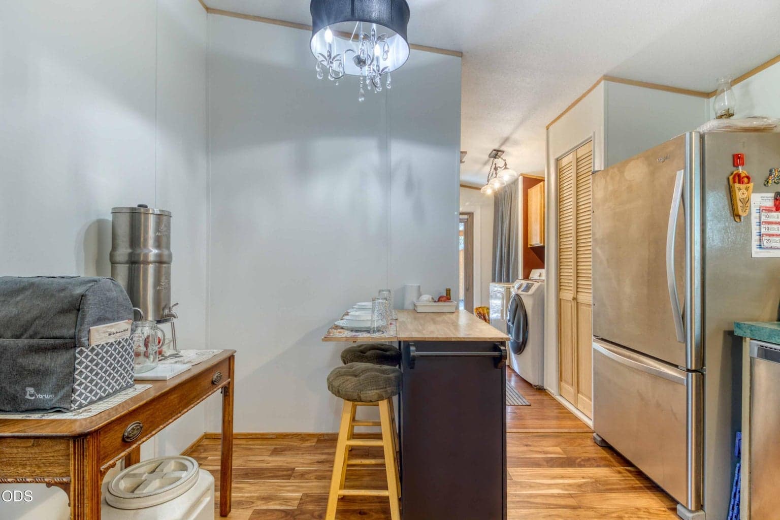 Eating area and laundry/mud room with door out to lovely deck
