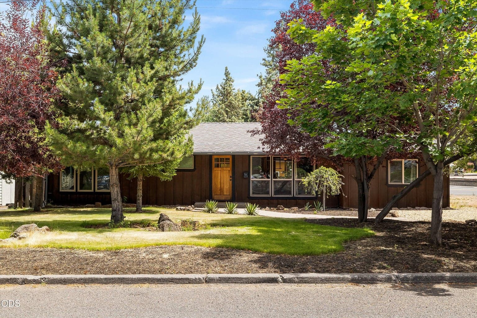 Tucked in nicely, the mature trees add privacy.