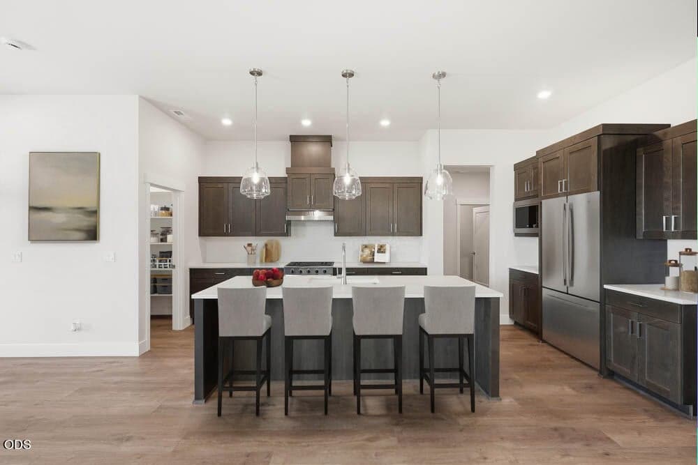Subject property kitchen with virtual staging. Refrigerator is included!