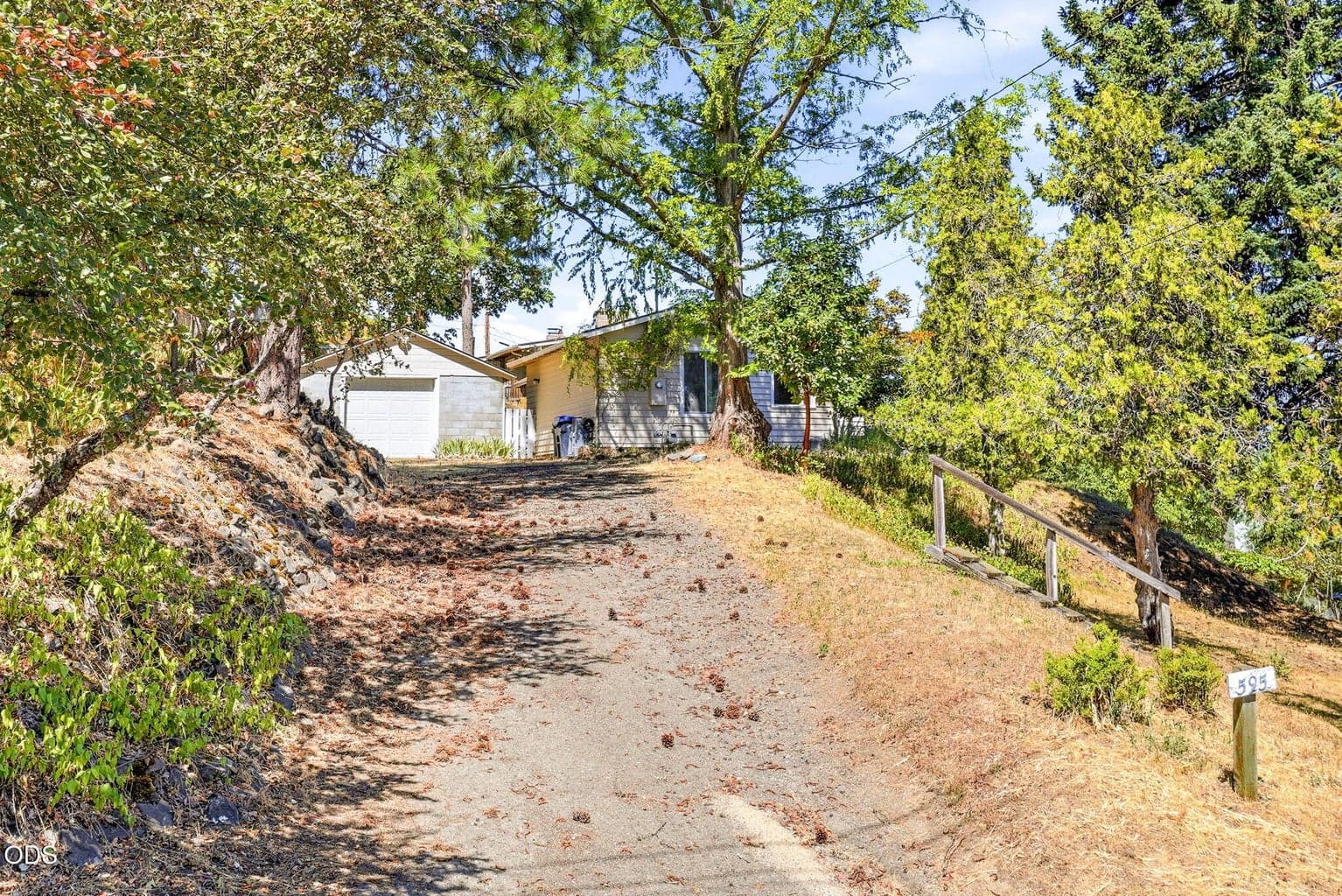 Driveway to home and garage