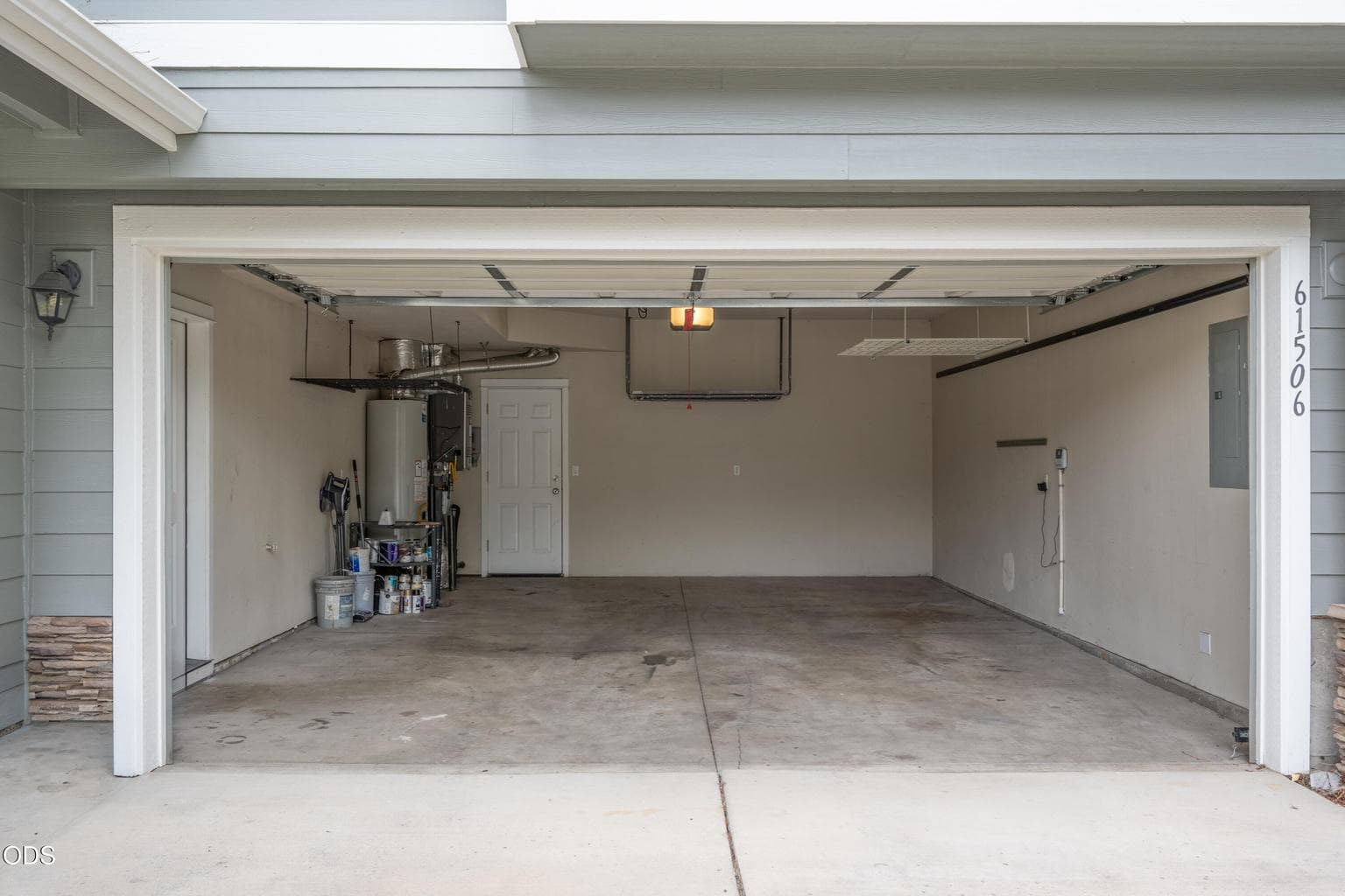 Large two -car garage with exterior door to the back yard