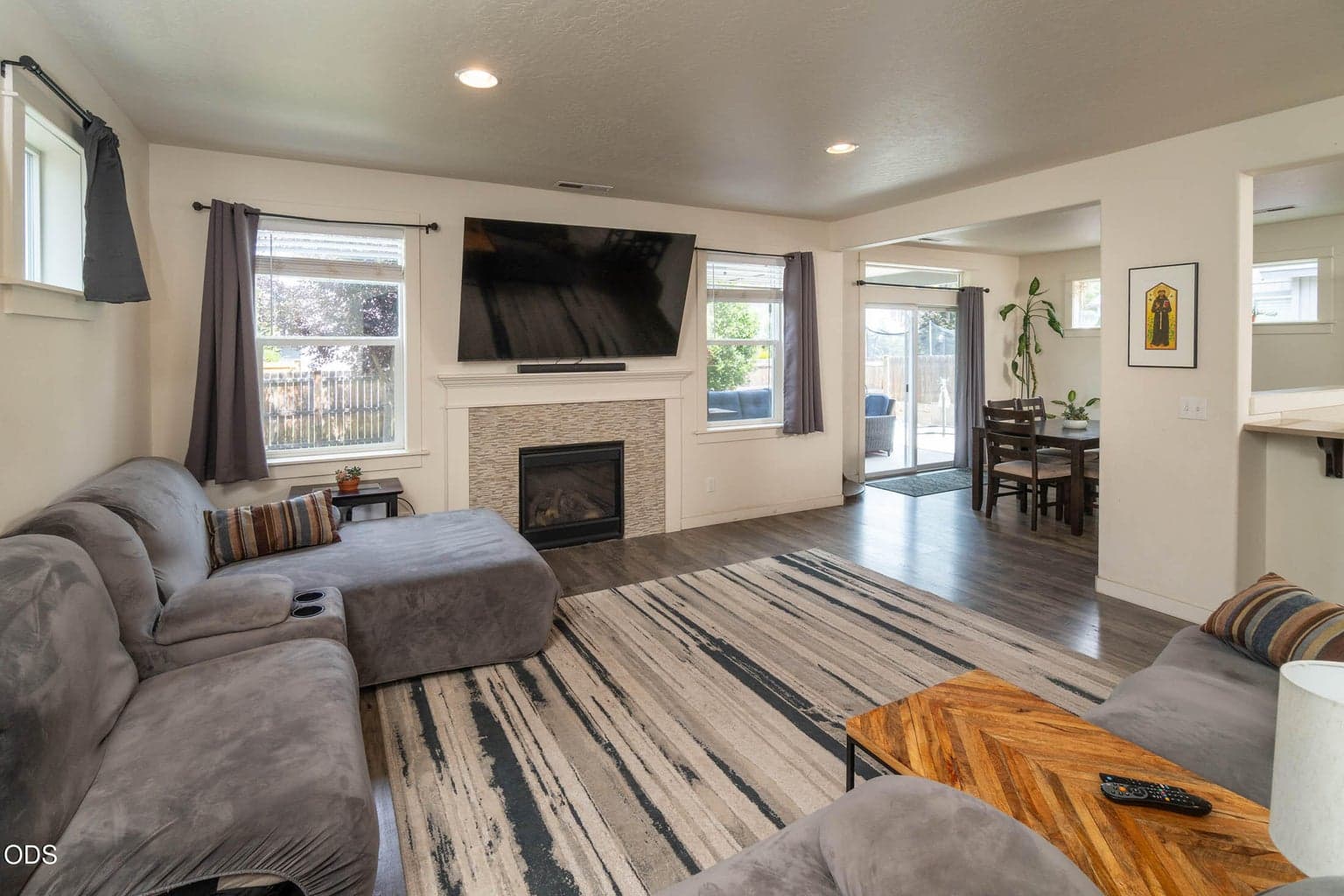 Laminate flooring & lots of windows!