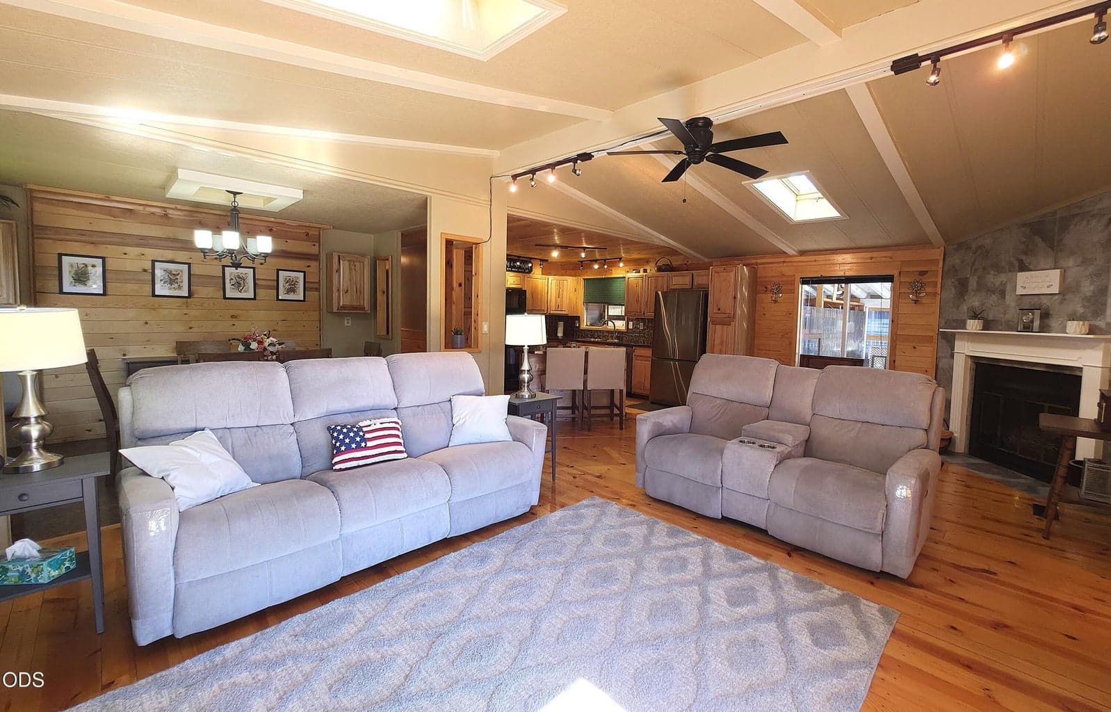 Great Room has vaulted ceiling, skylights and ceiling fan