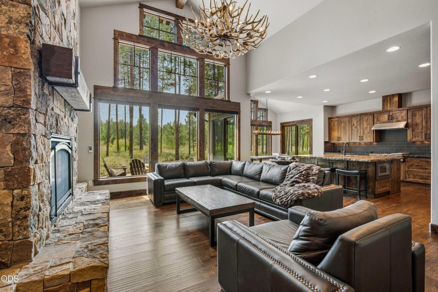 Thoughtfully designed for everyday living and entertaining, the open great room and kitchen connect seamlessly to the outdoor spaces and the protected natural landscape beyond.