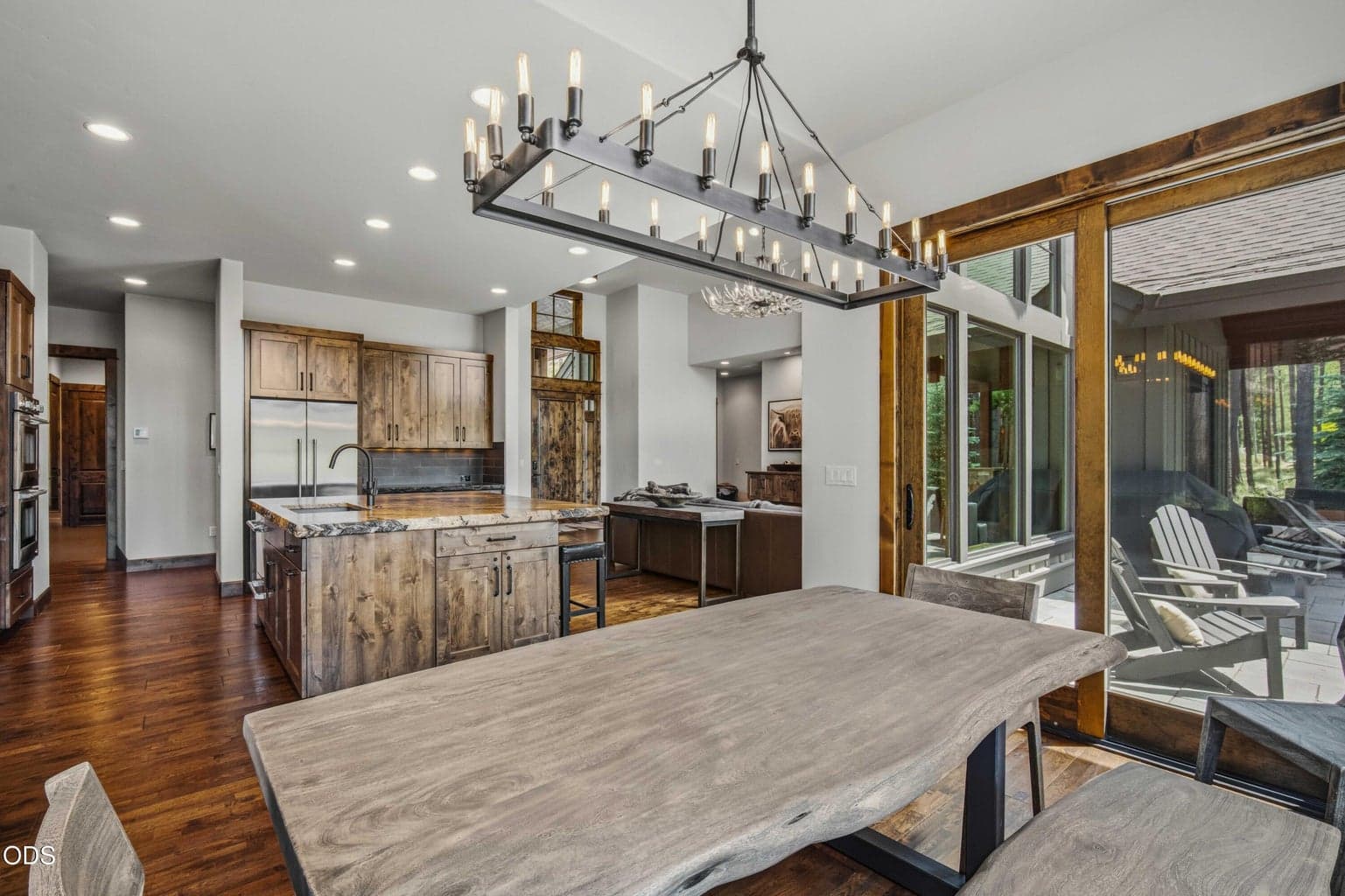 This inviting dining space sits between the kitchen and outdoor living areas, creating an easy flow for entertaining or relaxed everyday living.