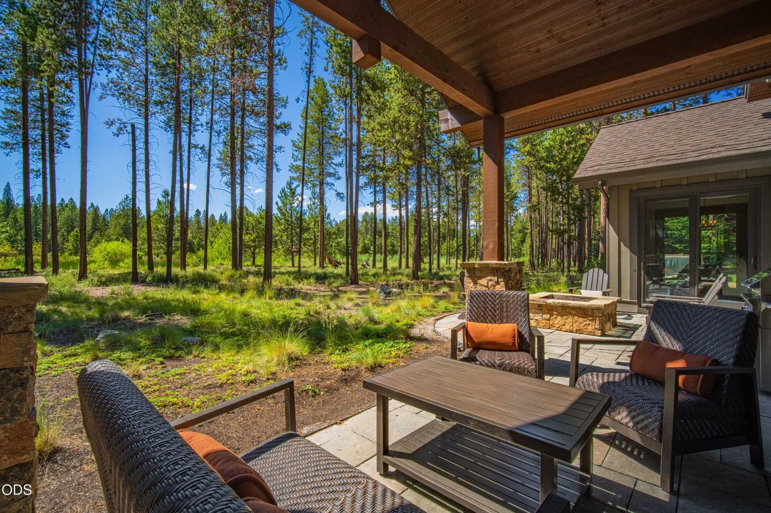 The covered patio captures the feeling of being worlds away while remaining moments from Caldera Springs’ premier amenities.