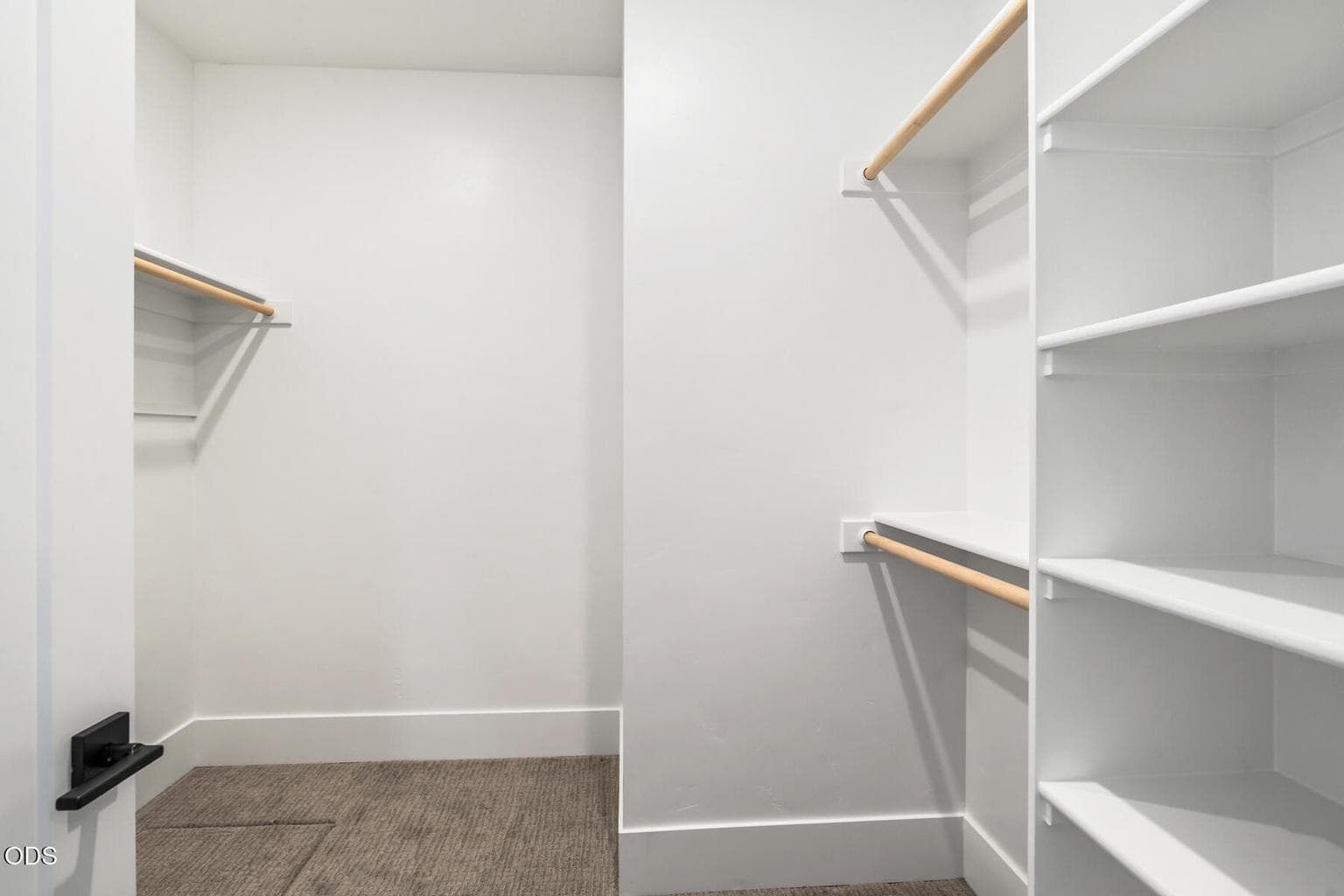 Primary walk-in closet.