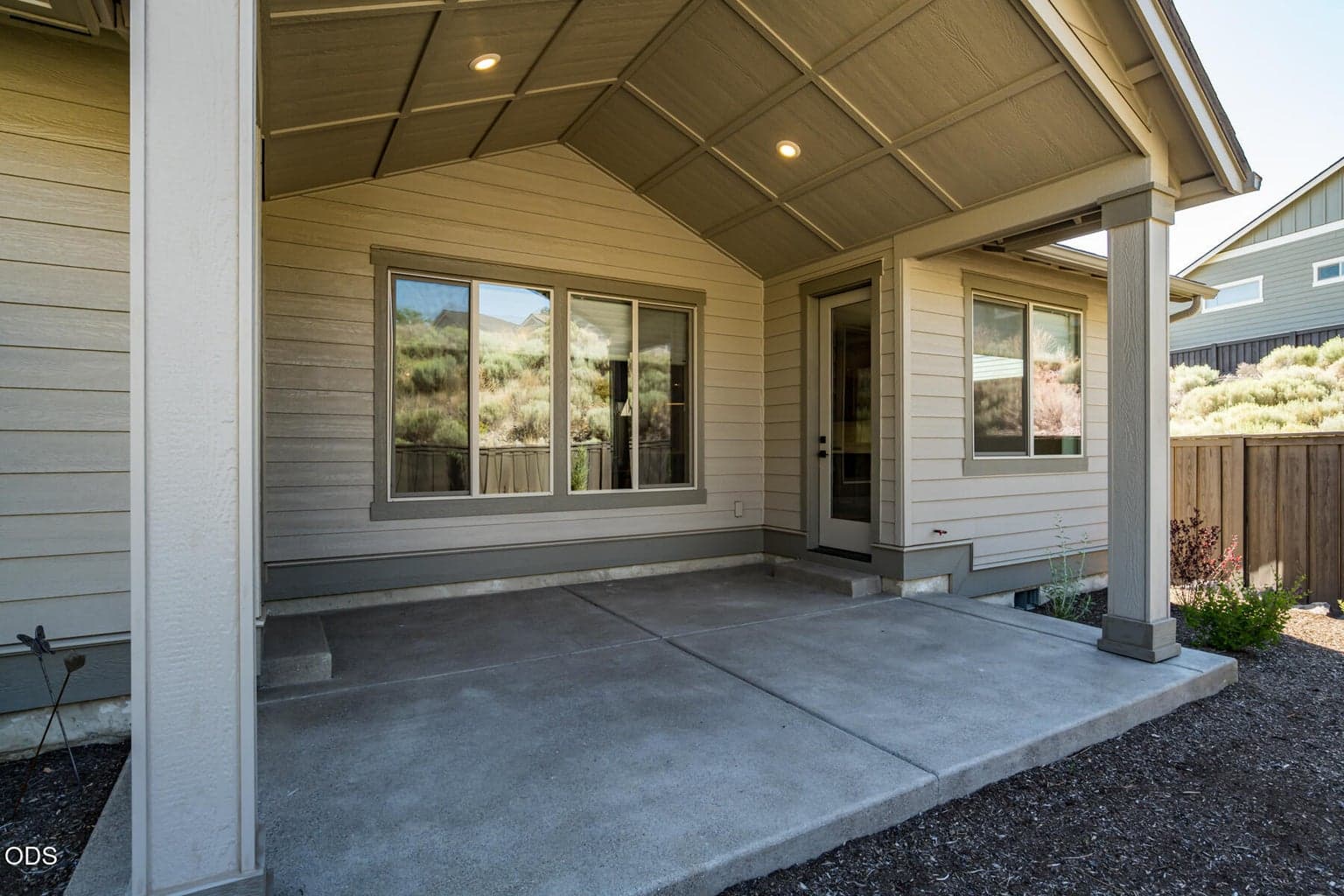 Covered back patio. Access from primary and dining.
