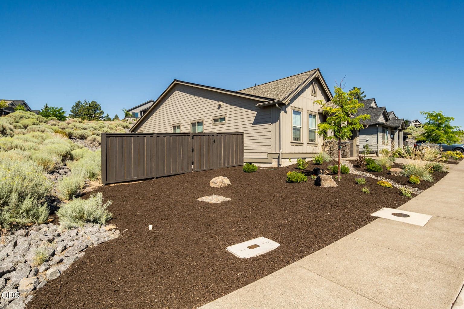 Front side yard. No immediate side neighbor.