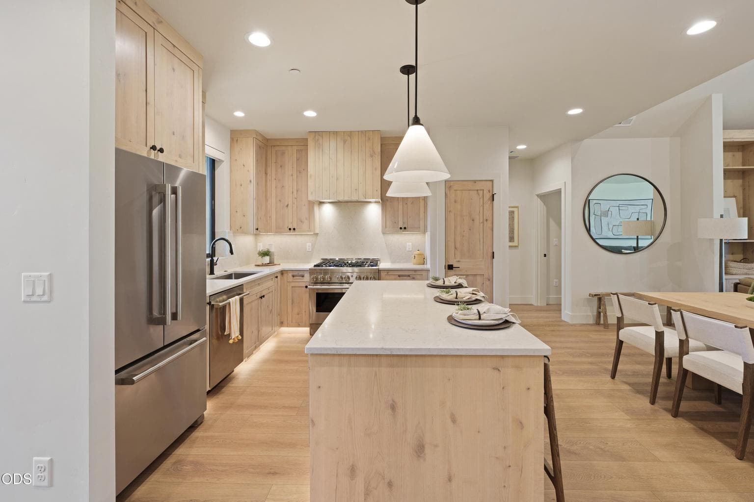 Photo of similar home. Finishes are the same. Furniture not included.