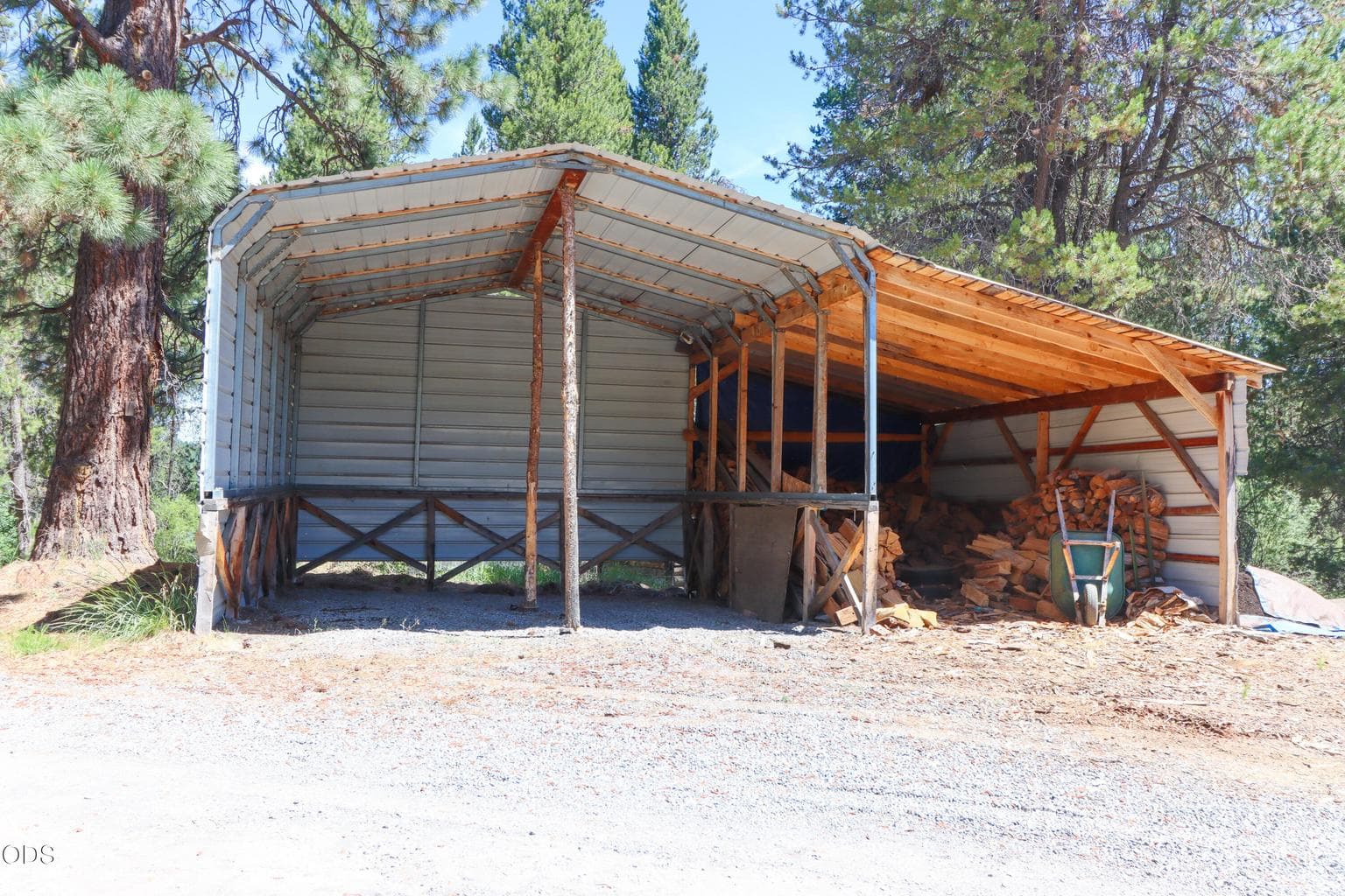 Wood Storage & Dual Carport for Additional Vehicles