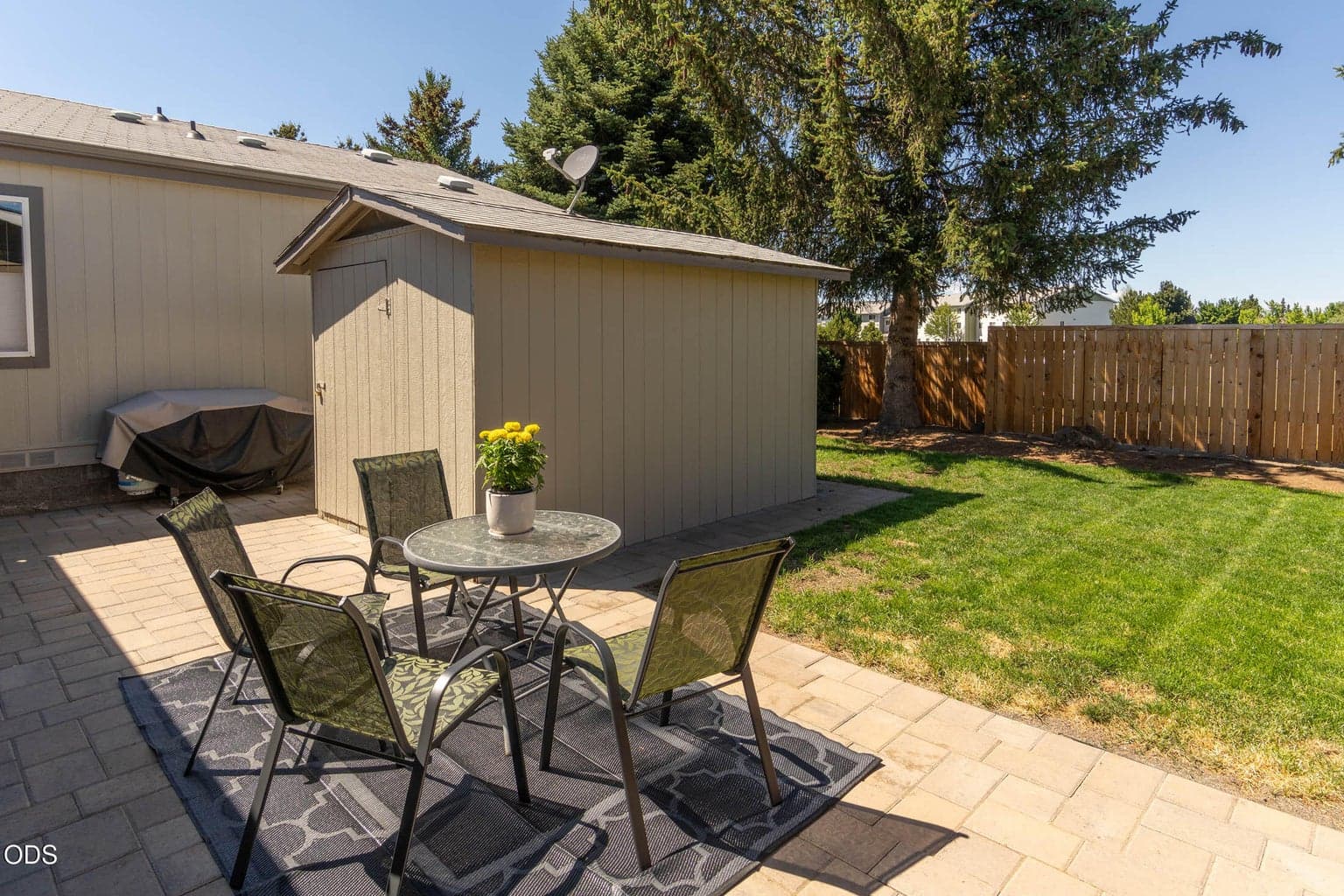 Lovely newer paver patio in back yard is sizeable and beautiful. The back yard is fenced, gated, private. Perfect for BBQ or entertaining. Back door entry would also be perfect for the pet-lover.