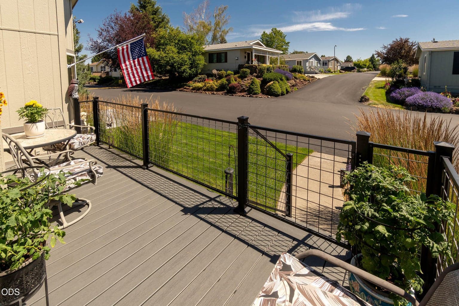 Nice feeling of space out front, only 2 lots away from the RV parking area, also close to the covered mail center, situated in a quiet area on the Northern perimeter of park.