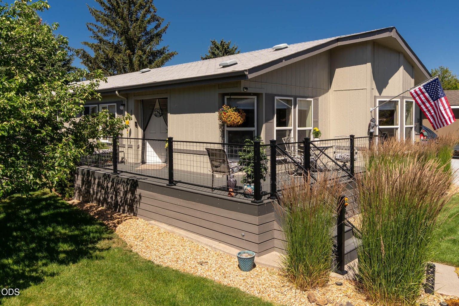 Another glimpse of the quality well-built deck. This "Trex" deck is newer and features metal railing and gate. Would be ideal for pets.