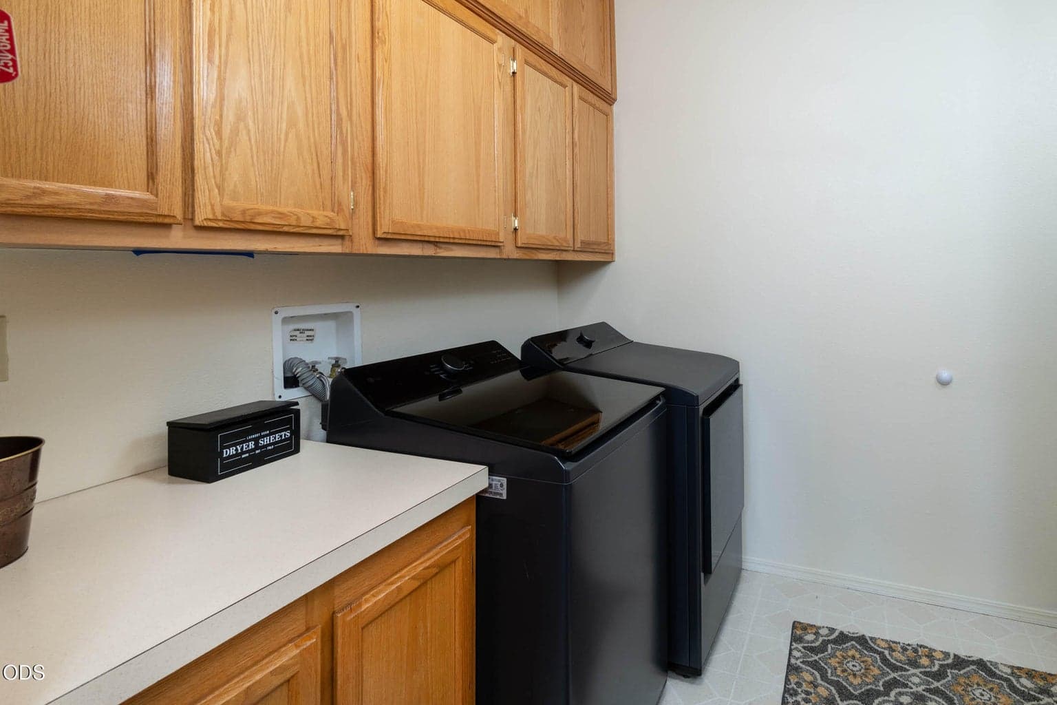 Utility room has plenty of cabinets, extra counter space when having guests. Also provides convenient access to the garage and back door. (Not shown is the handy broom closet).