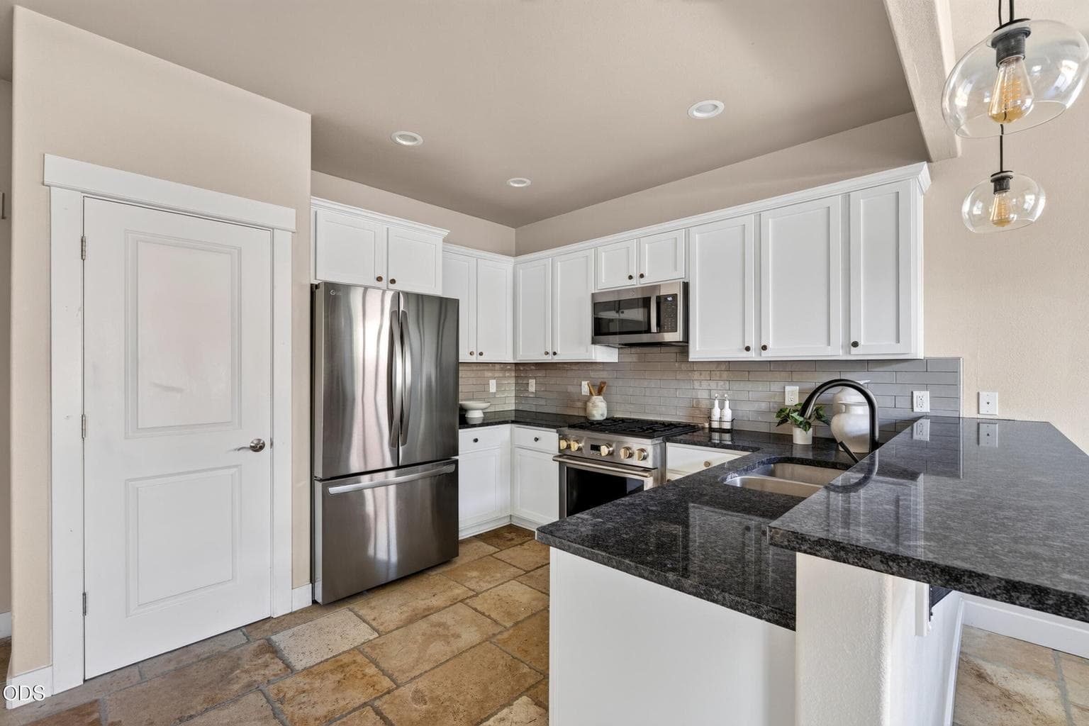 Kitchen with stainless steel appliances