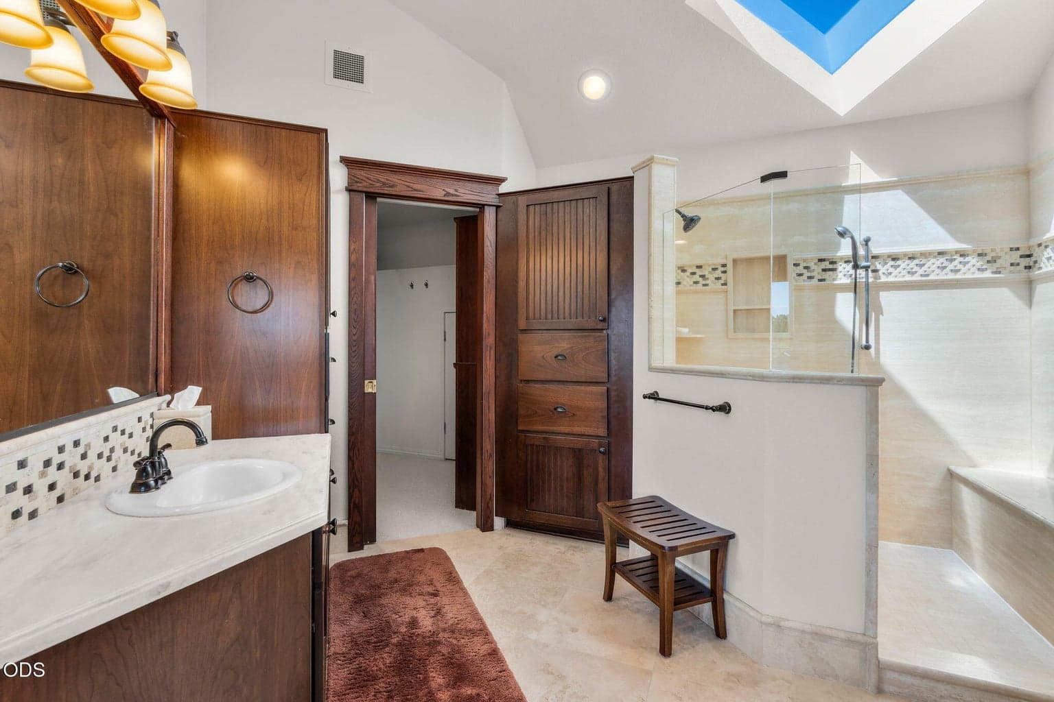 Primary bath with large walk in tiled shower