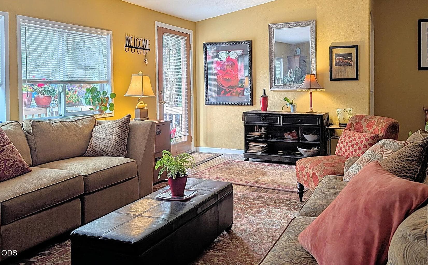 Great room is cozy with warm tones