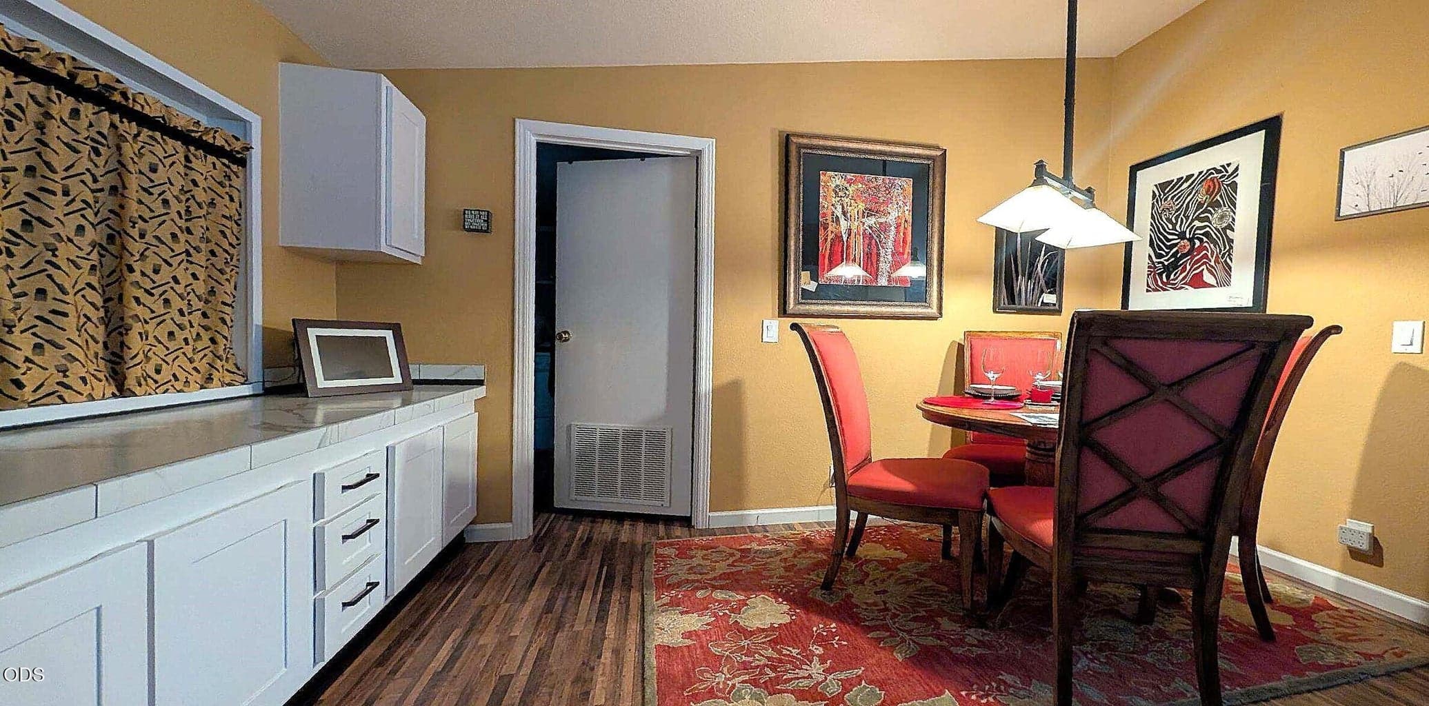Extensive cabinetry and dining area