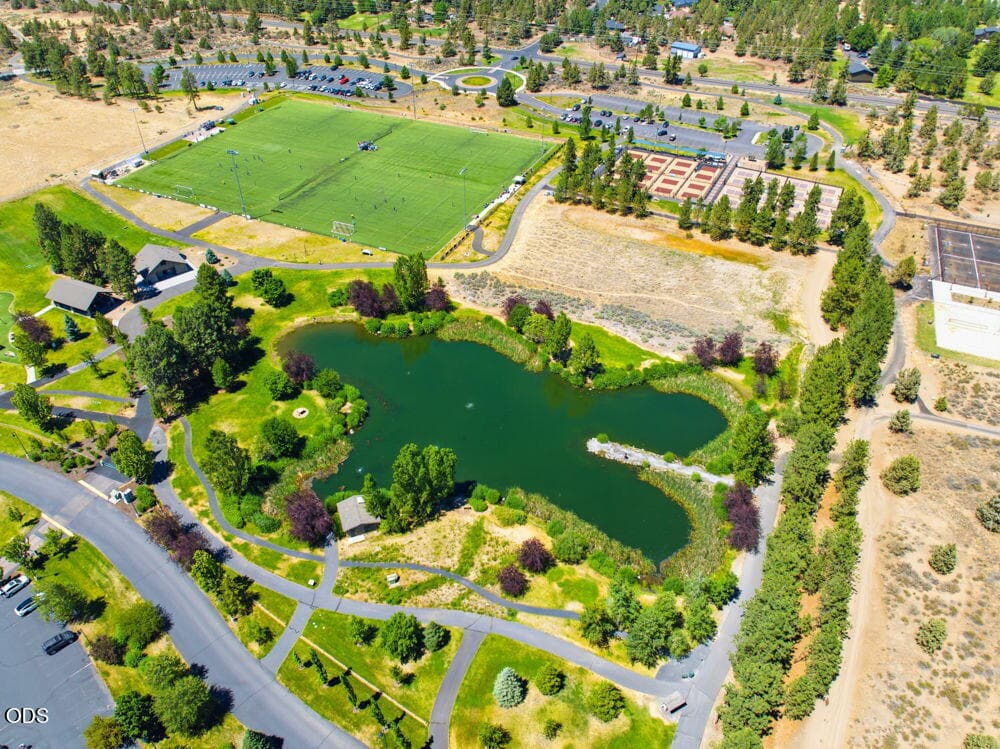 Pine Nursery Park 1 Mile Away. Includes pickleball facility, off leash dog park, fishing pond, disc golf and play structures.