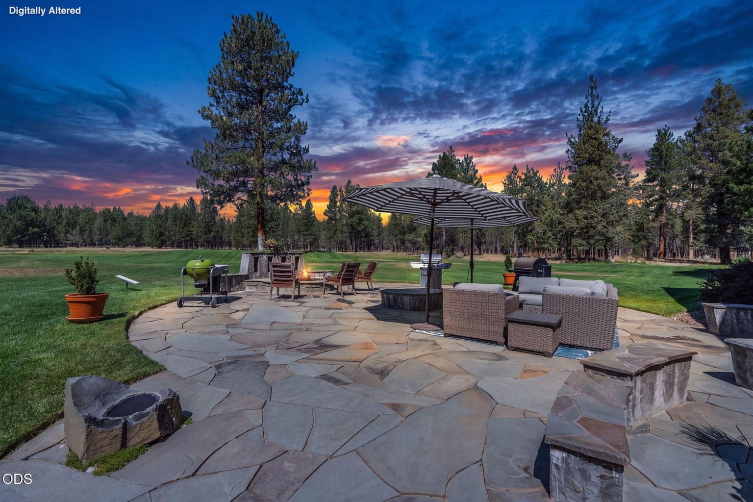 Flagstone patio, firepit and water feature
