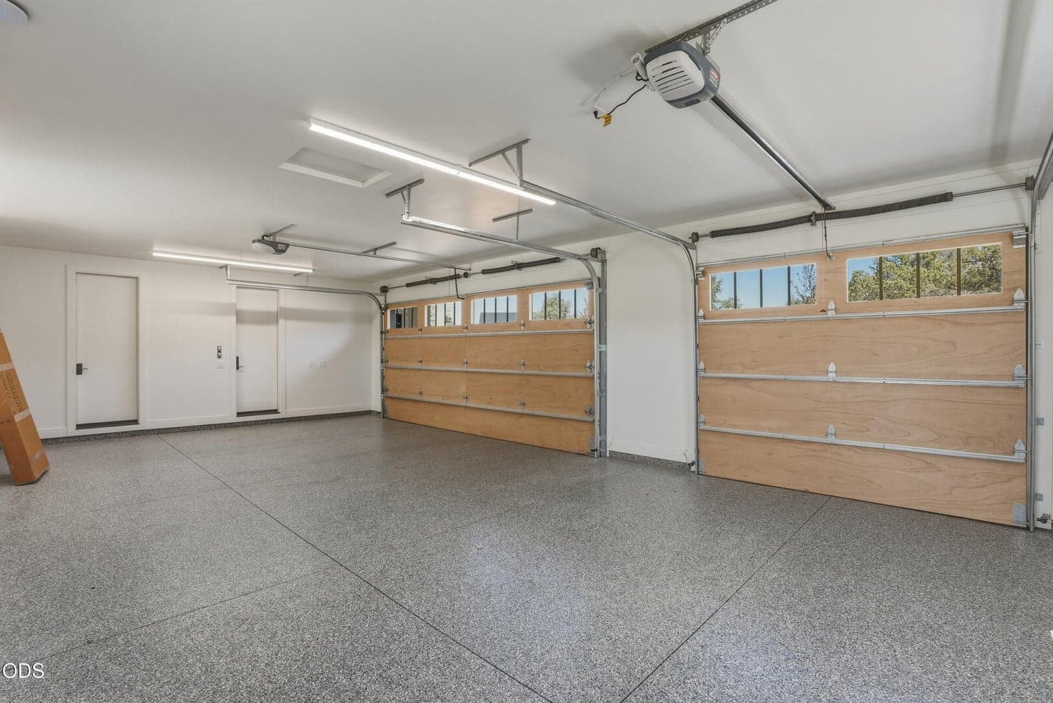 3 Car Garage with plenty of space for a golf cart
