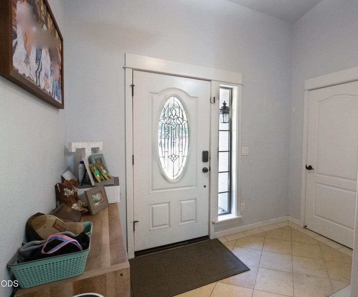 Nice coat closet at welcoming tiled entry