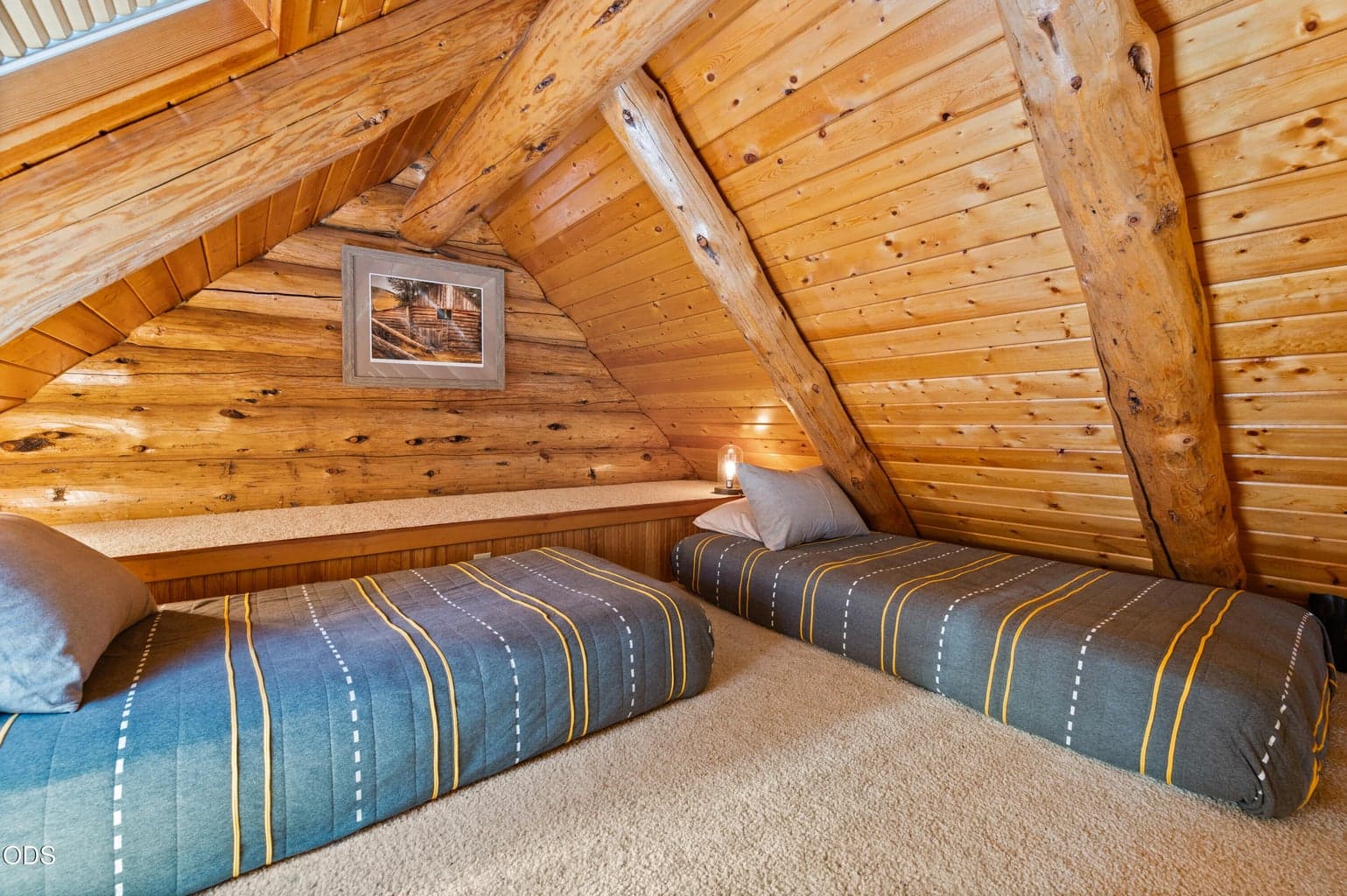 2 twin beds in the sleeping loft create more guest space