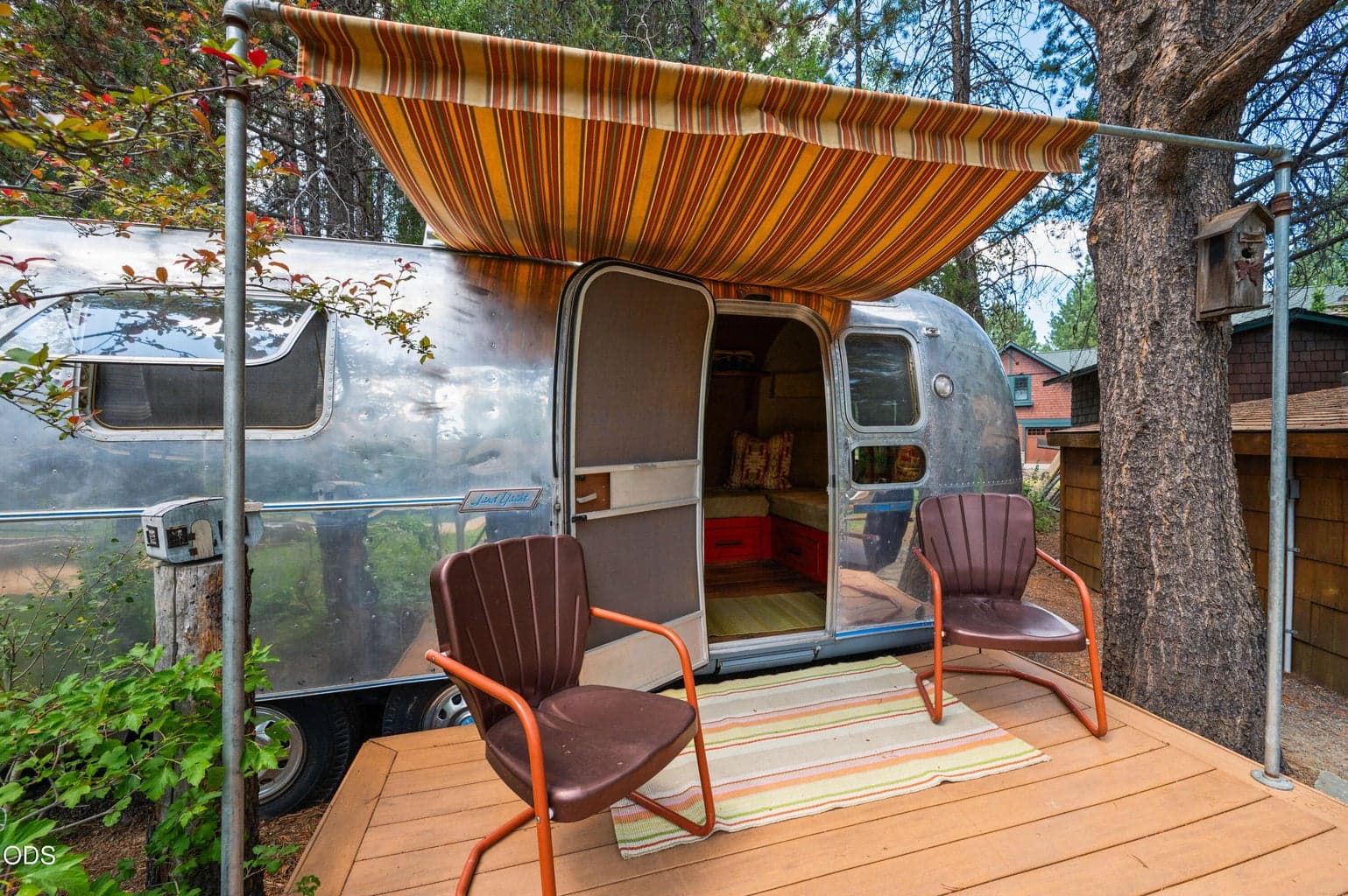 Guests will love this delightful airstream that has been lovingly remodeled offering a whimsical and comfortable space overlooking the pool.