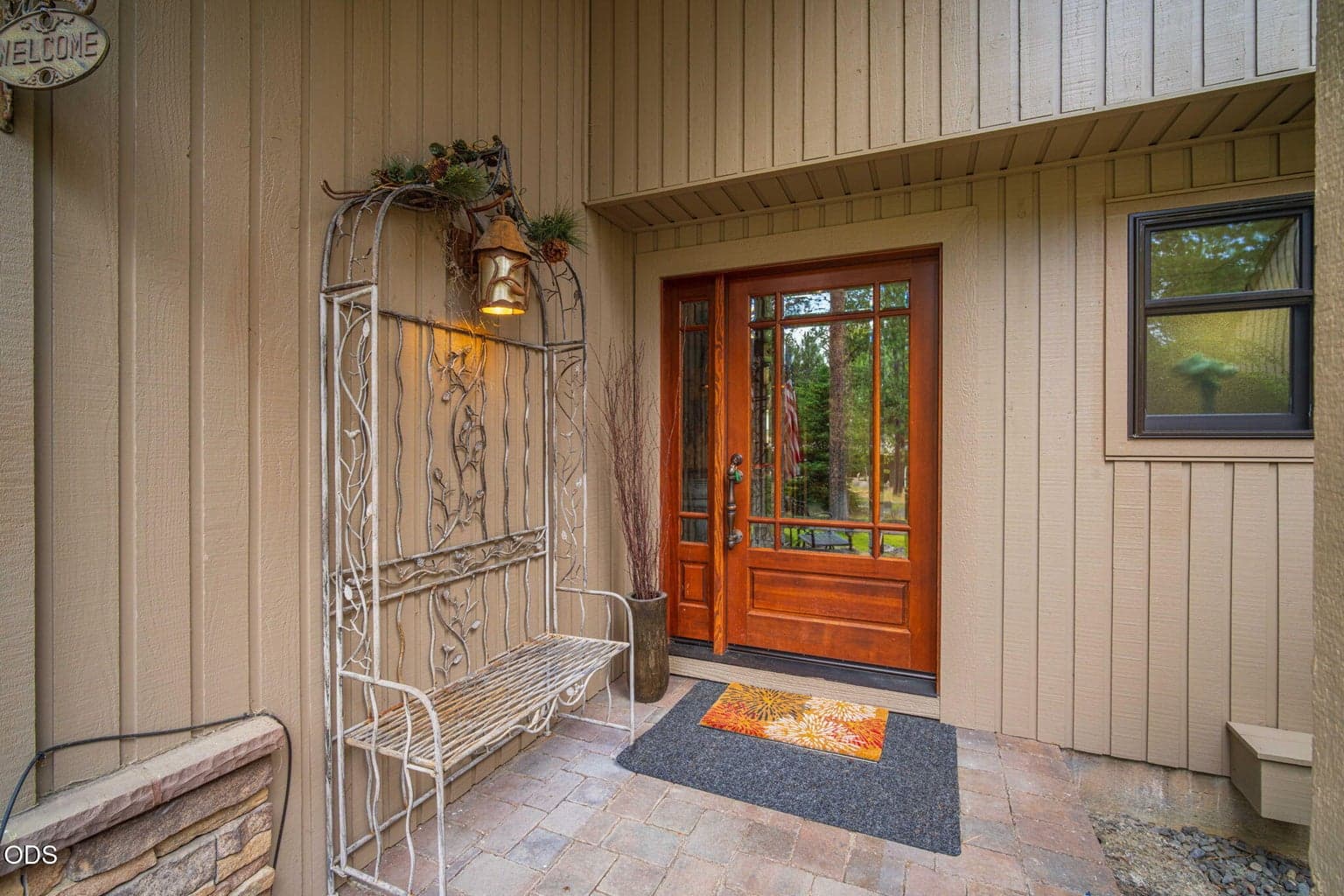Covered front porch makes getting out of the elements and greeting guests a breeze.