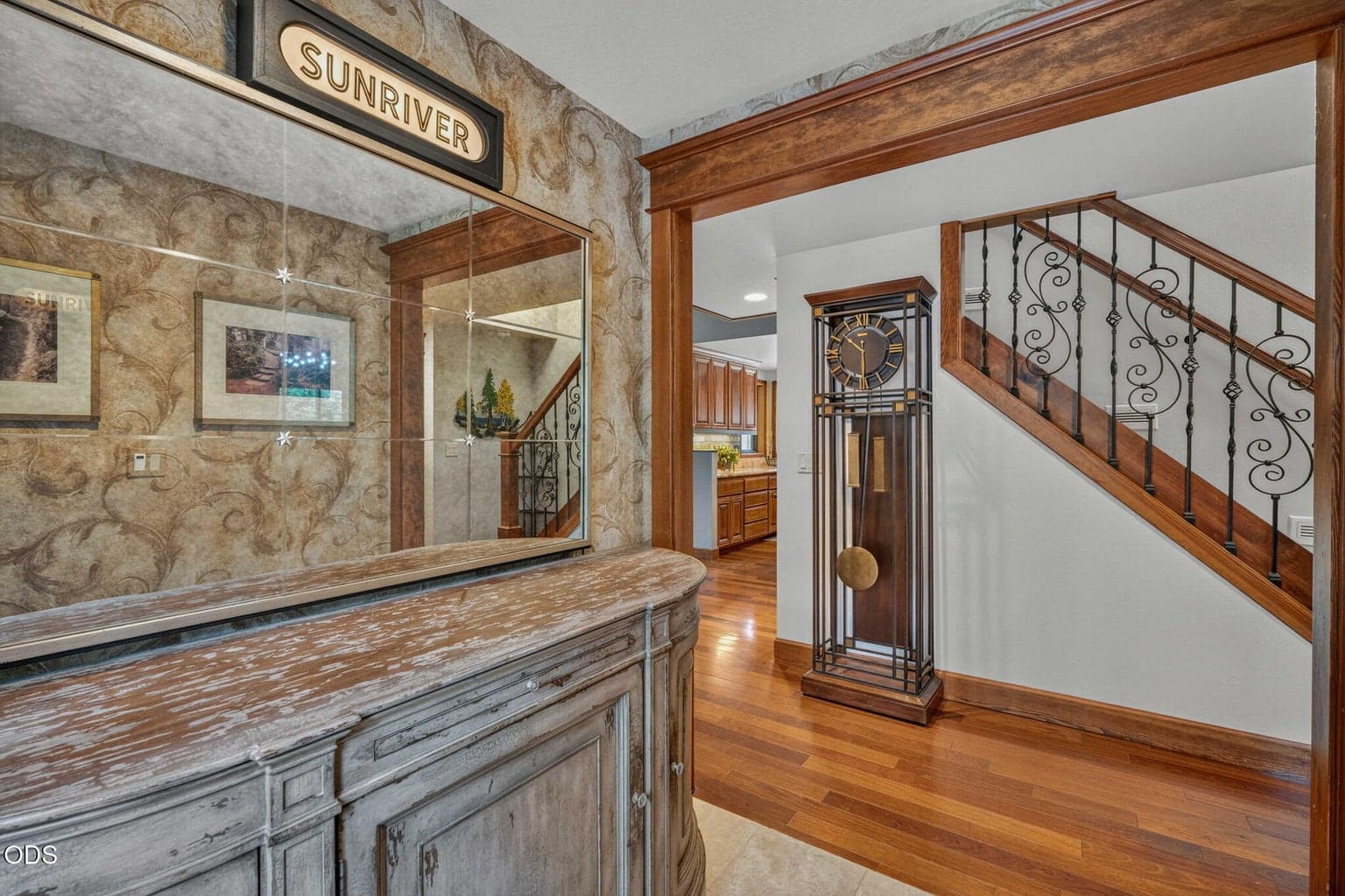 Travertine tile meets rich, deep tones of Brazillian cherry wood that leads to the great room.