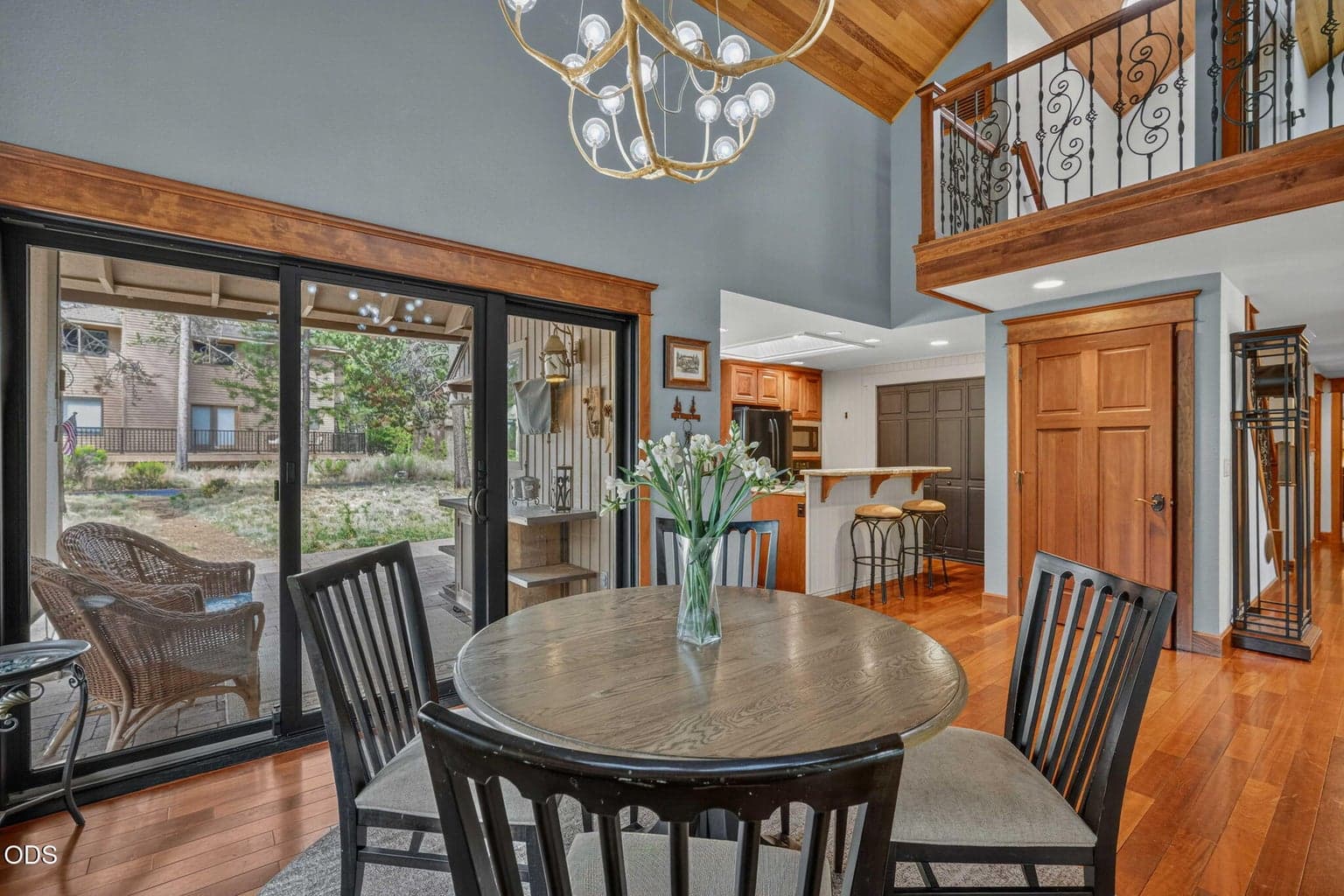 Open kitchen flows to great room - granite, wood and stone blend for timeless elegance.