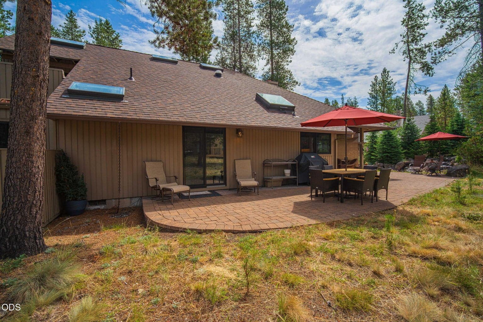 A broad paver patio set into the quarter acre lot, perfect for soaking in the quiet Central Oregon setting.